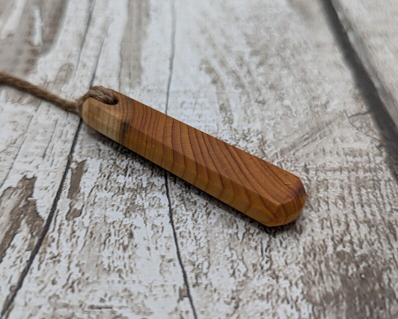 Yew wood roimata pendant.