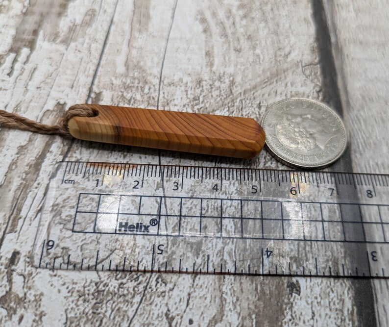 Yew wood roimata pendant.