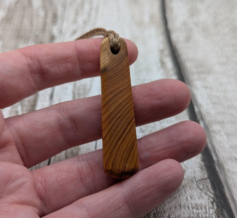 Yew wood roimata pendant.