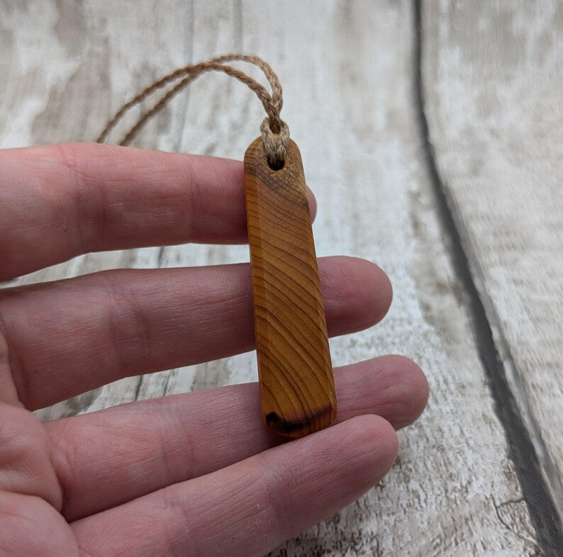 Yew wood roimata pendant.