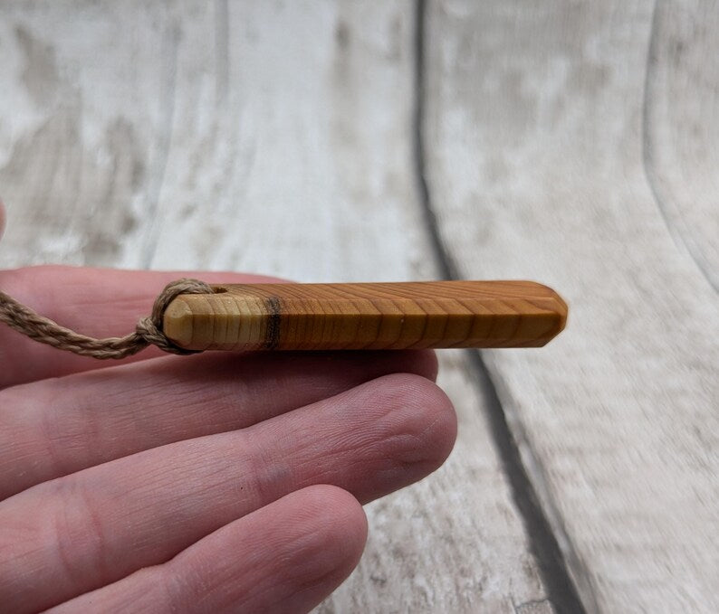 Yew wood roimata pendant.