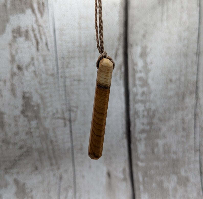 Yew wood roimata pendant.