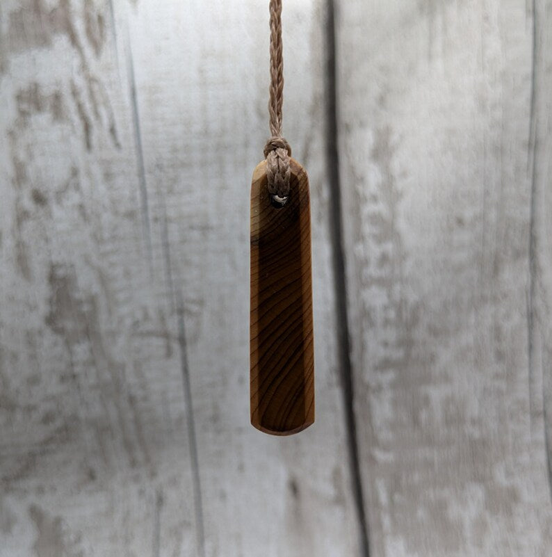 Yew wood roimata pendant.