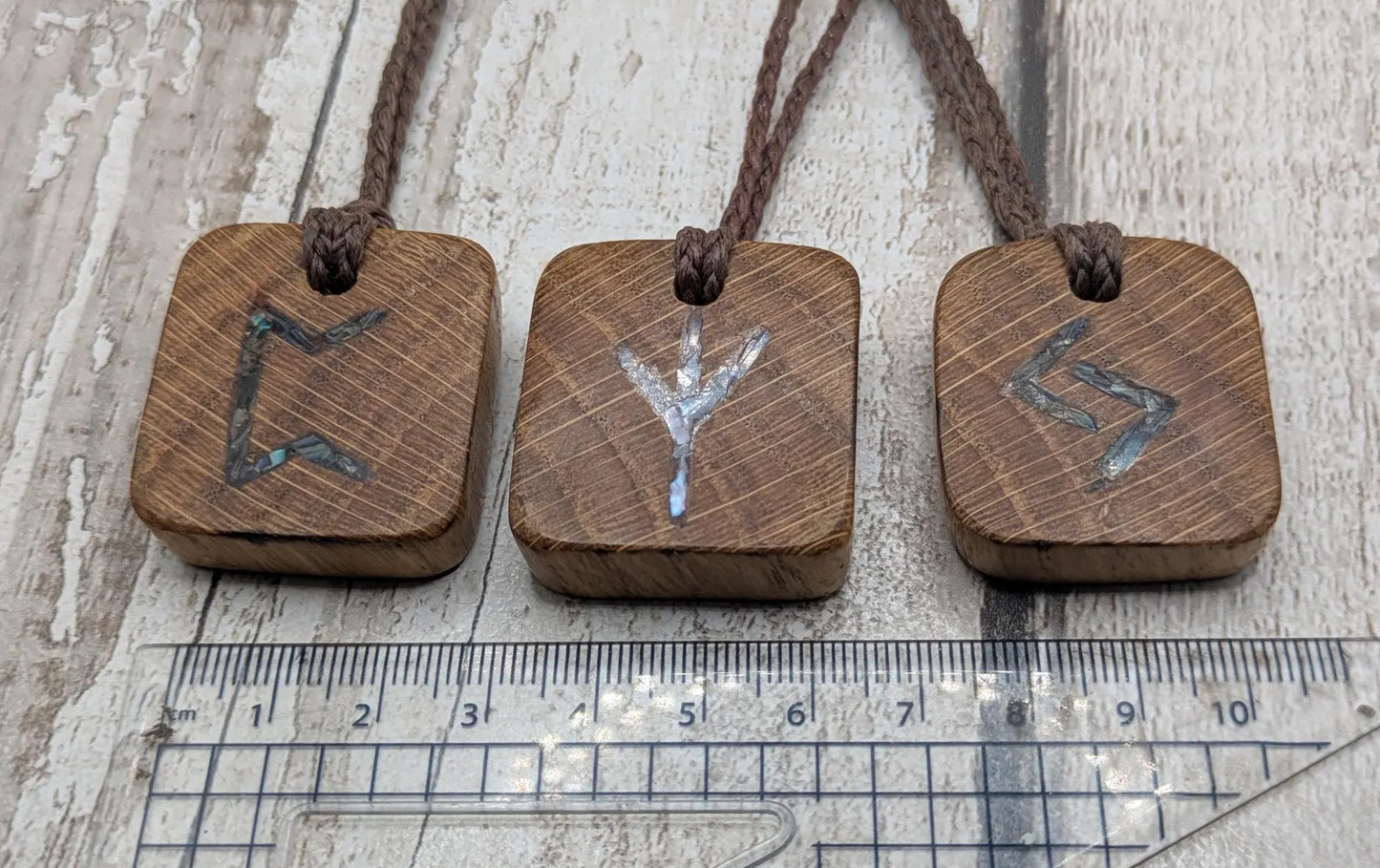 3 pack oak wood rune Christmas decoration with mussel shell inlay.