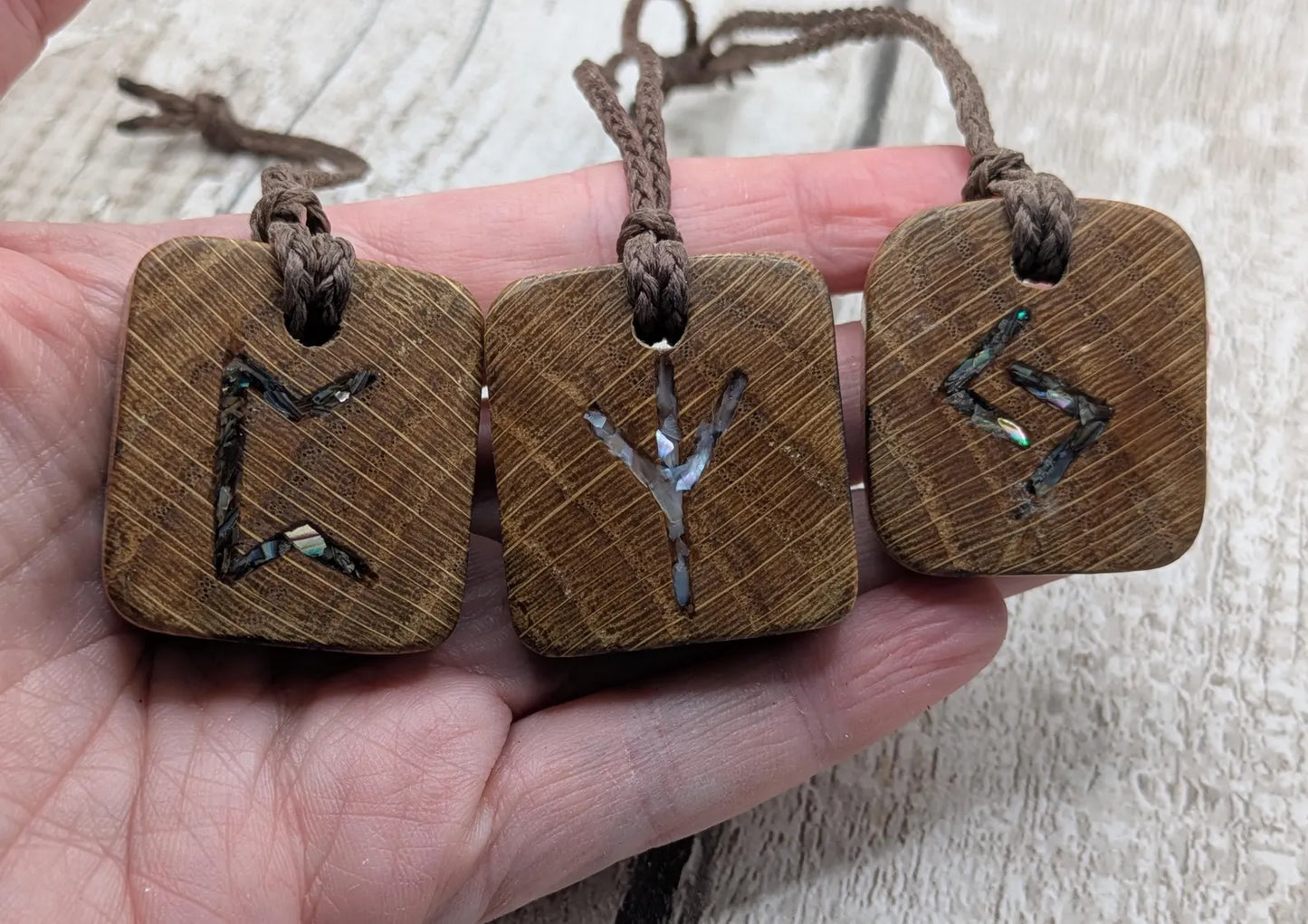 3 pack oak wood rune Christmas decoration with mussel shell inlay.