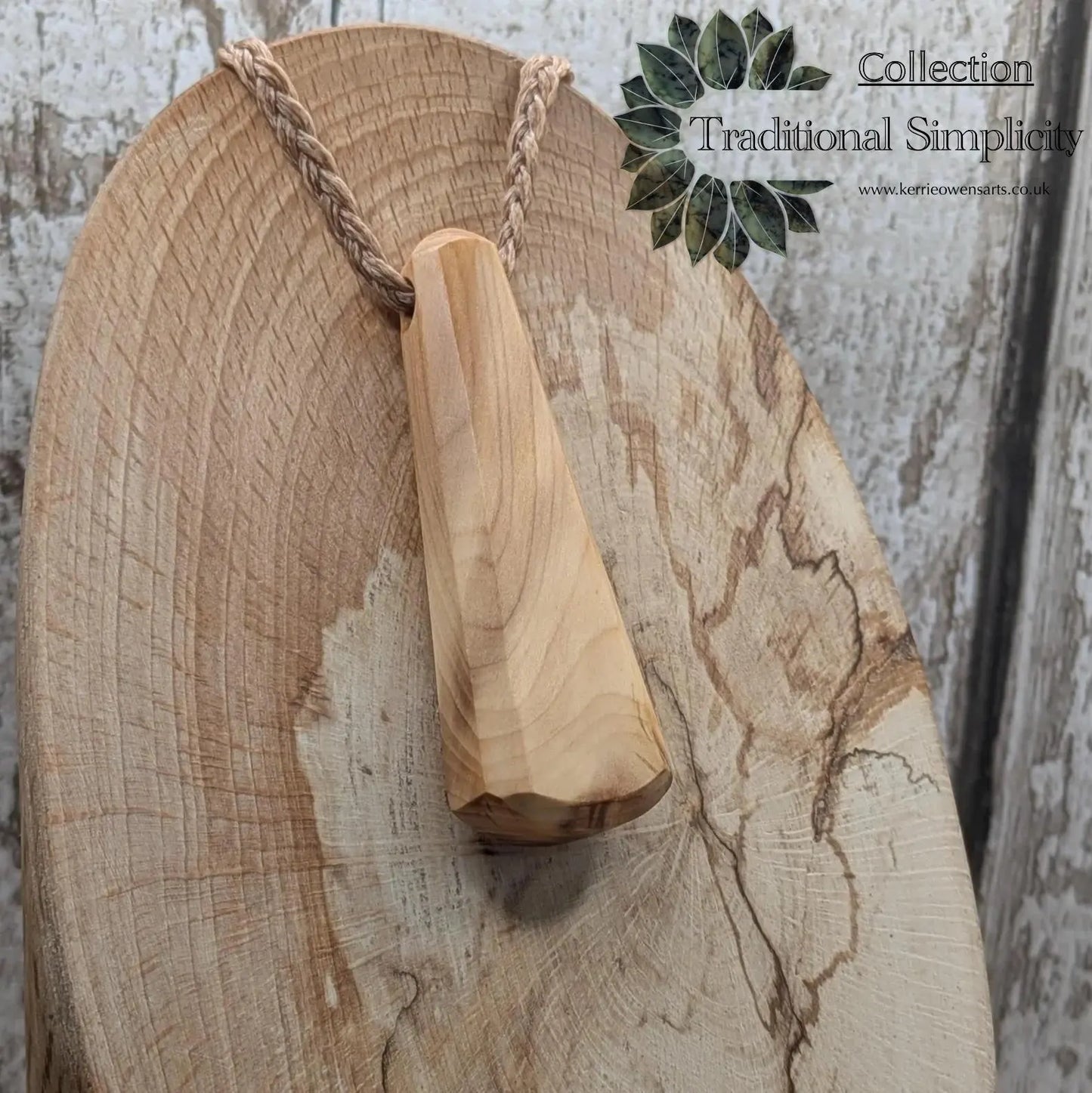 Yew wood roimata teardrop pendant.