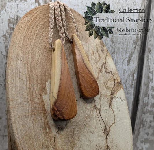 Yew wood roimata teardrop pendant.