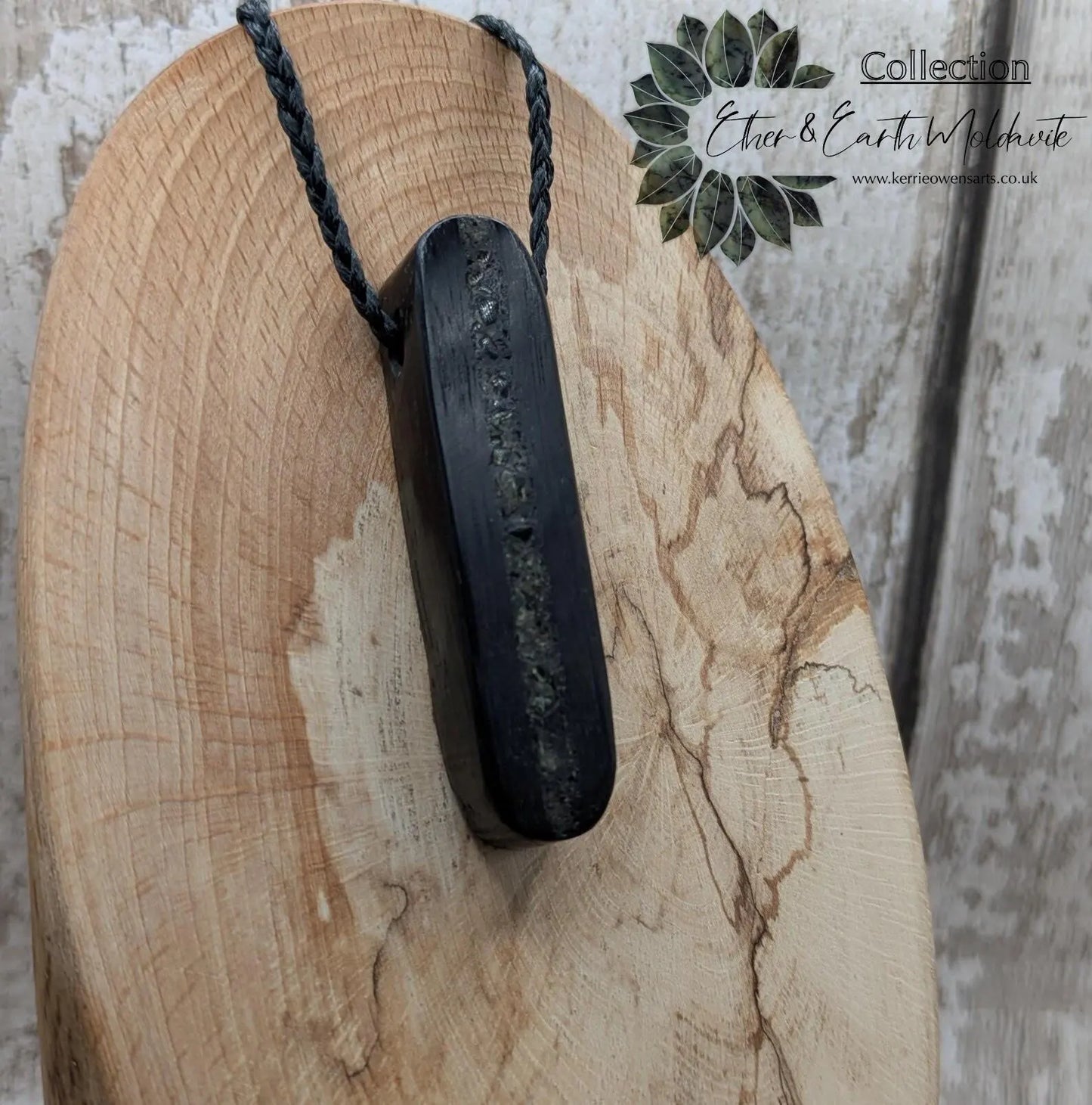 Bog oak and moldavite glass,