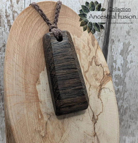 Bog oak heintoki adze styled unisex pendant.