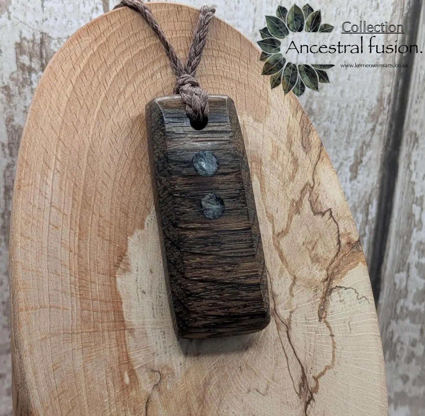 Bog preserved oak Hei Toki adze pendant with kanite inlay.