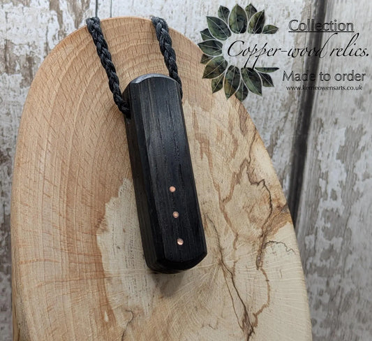 Fenland bog oak roimata pendant with copper pin.