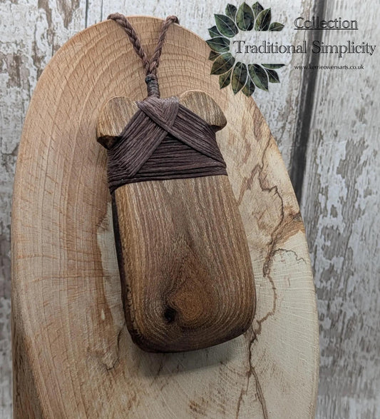 Laburnum wood, live edge, hey Toki adze pendant.