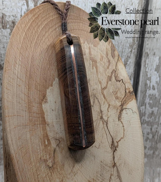 Laburnum wood with blue kyanite and copper pendant.
