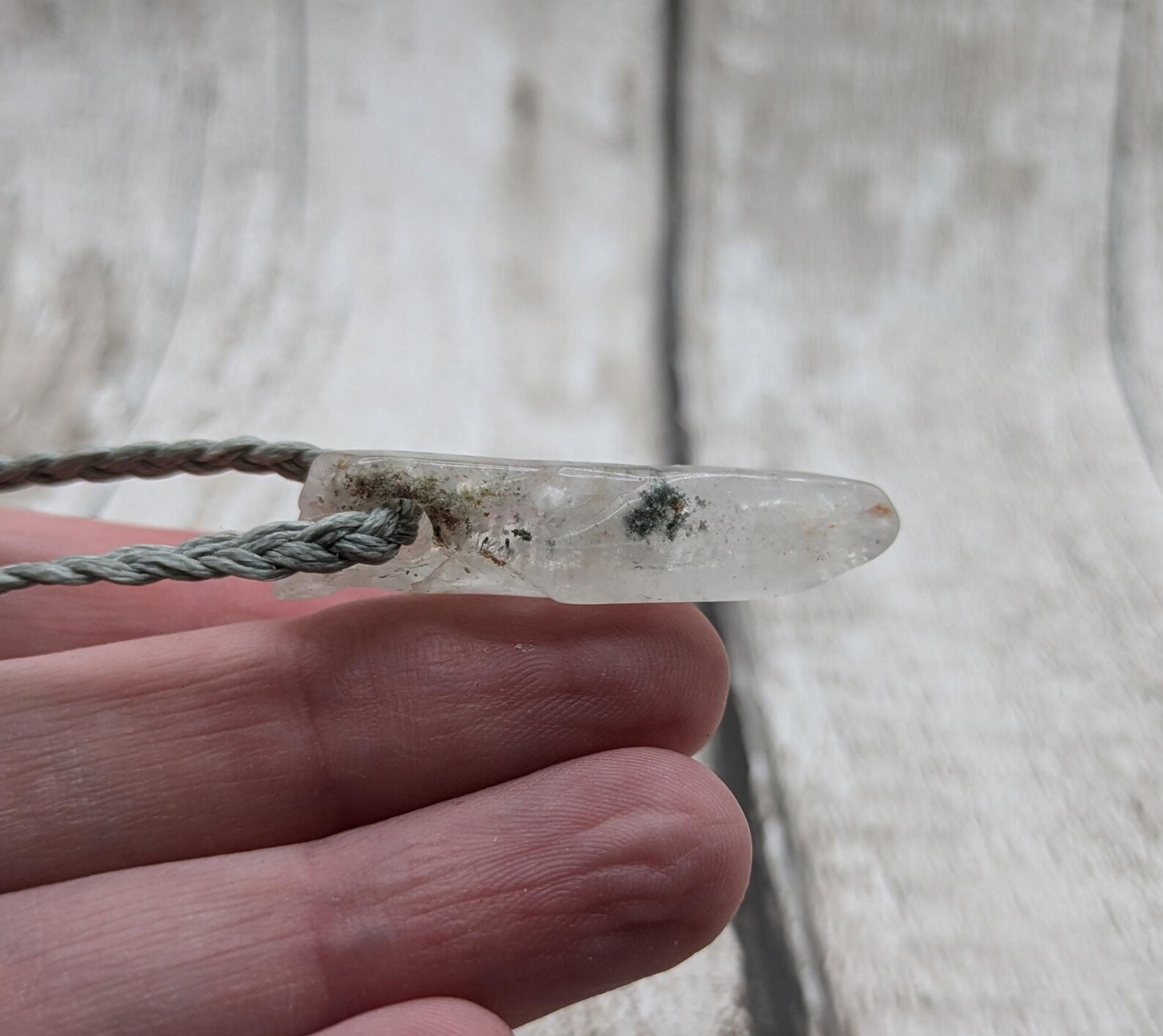 Quartz Crystal point pendant with inclusion.