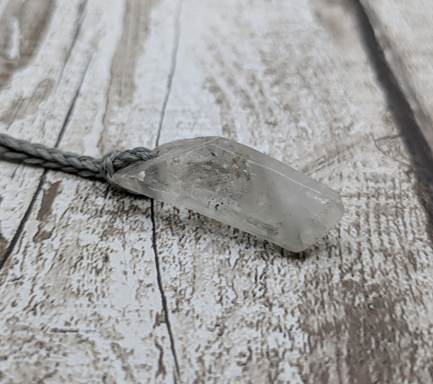 Clear quartz Crystal point pendant.