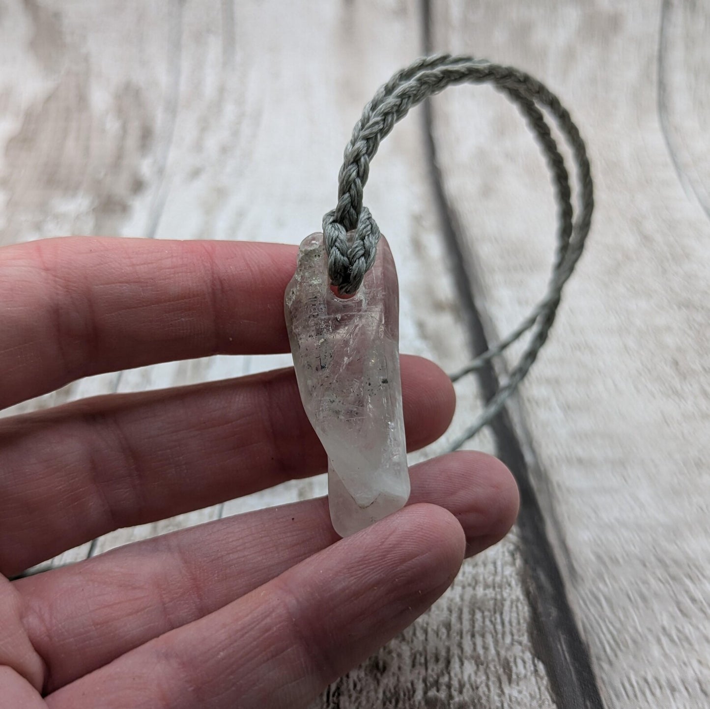 Clear quartz Crystal point pendant.