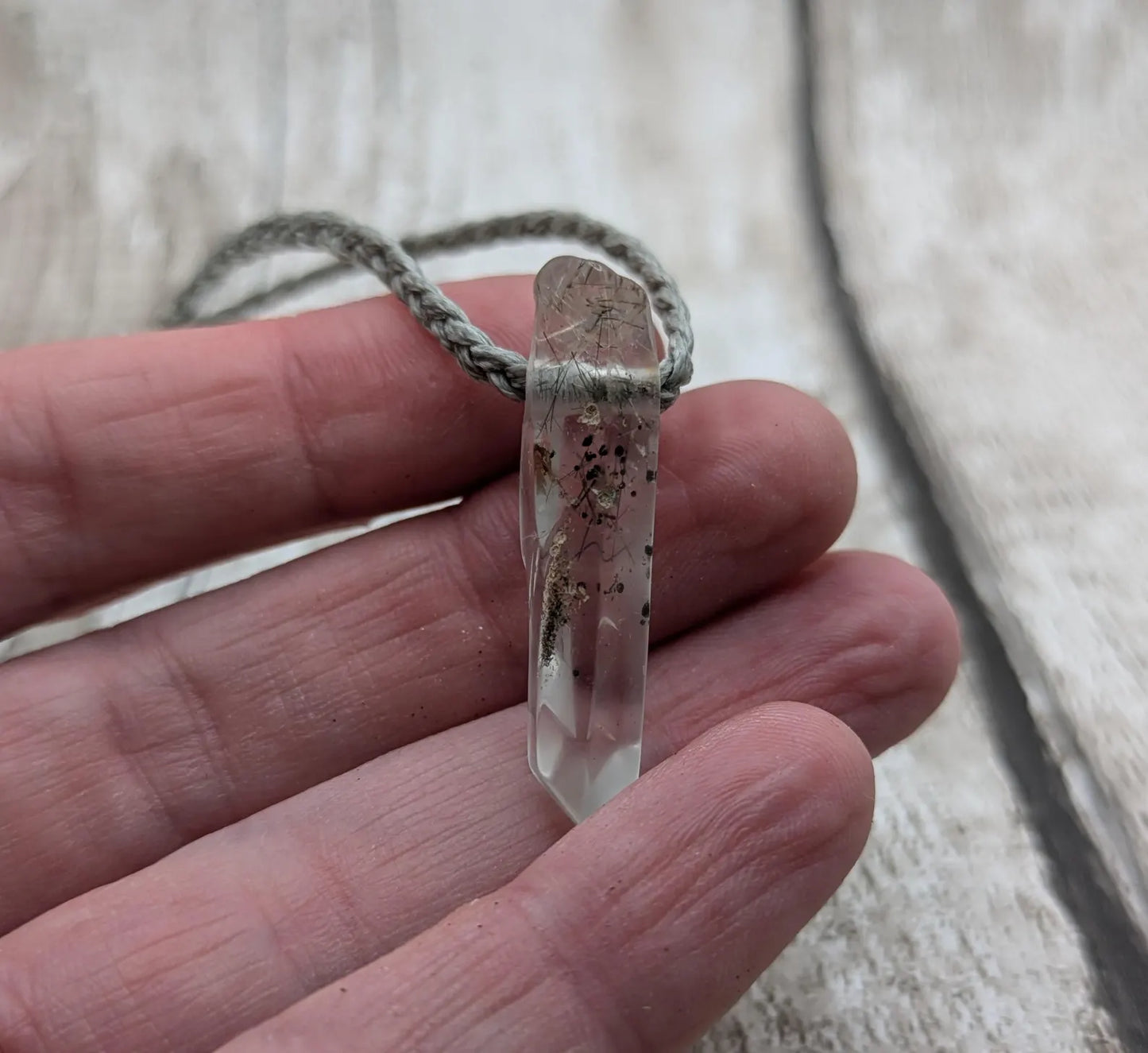 Rutilated quartz Crystal point pendant.