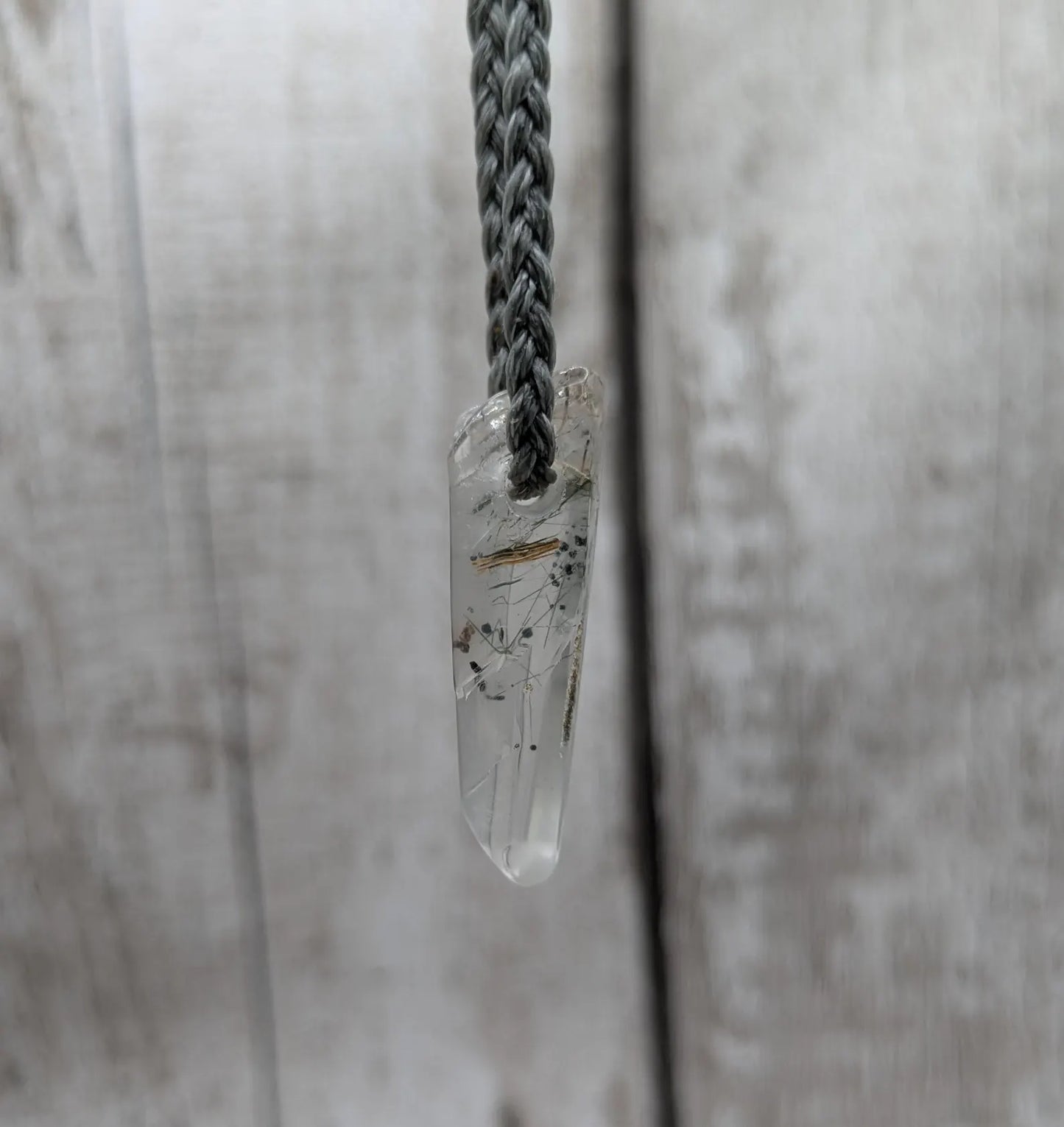 Rutilated quartz Crystal point pendant.