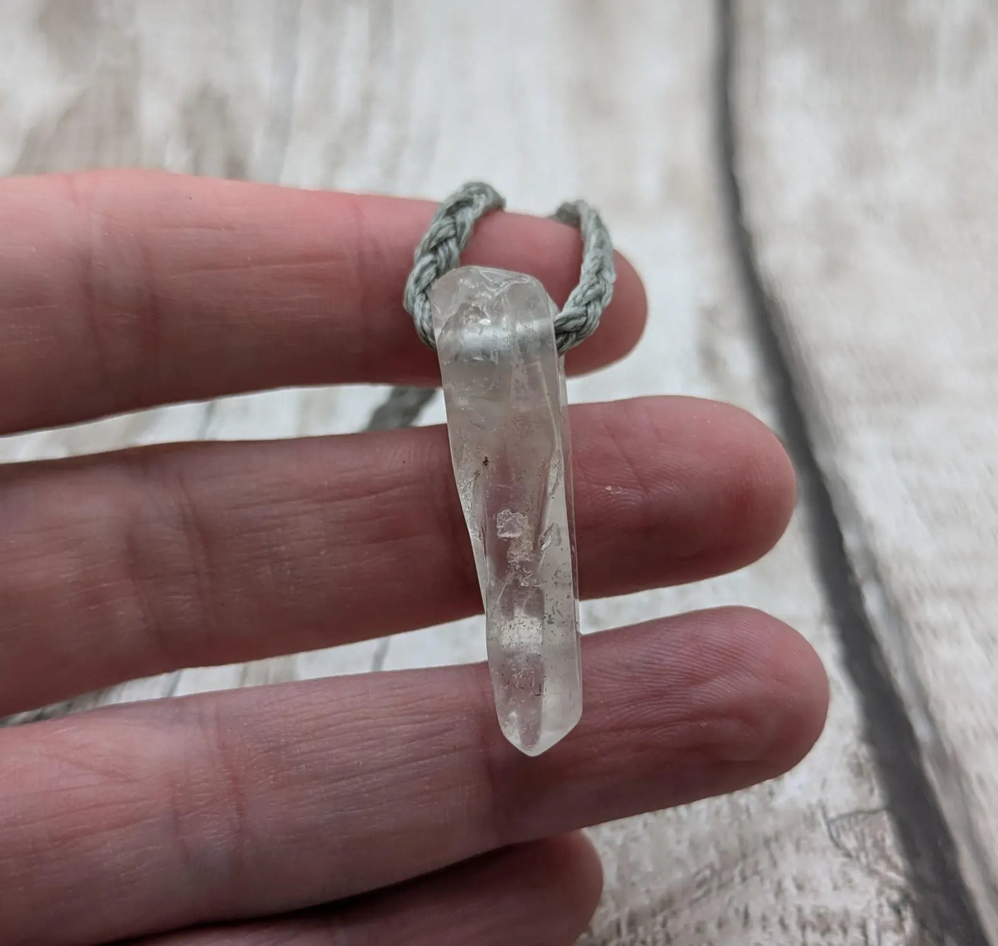 Clear quartz Crystal point pendant.