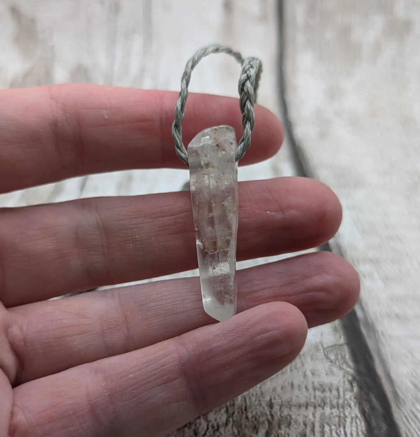 Clear quartz Crystal point pendant.