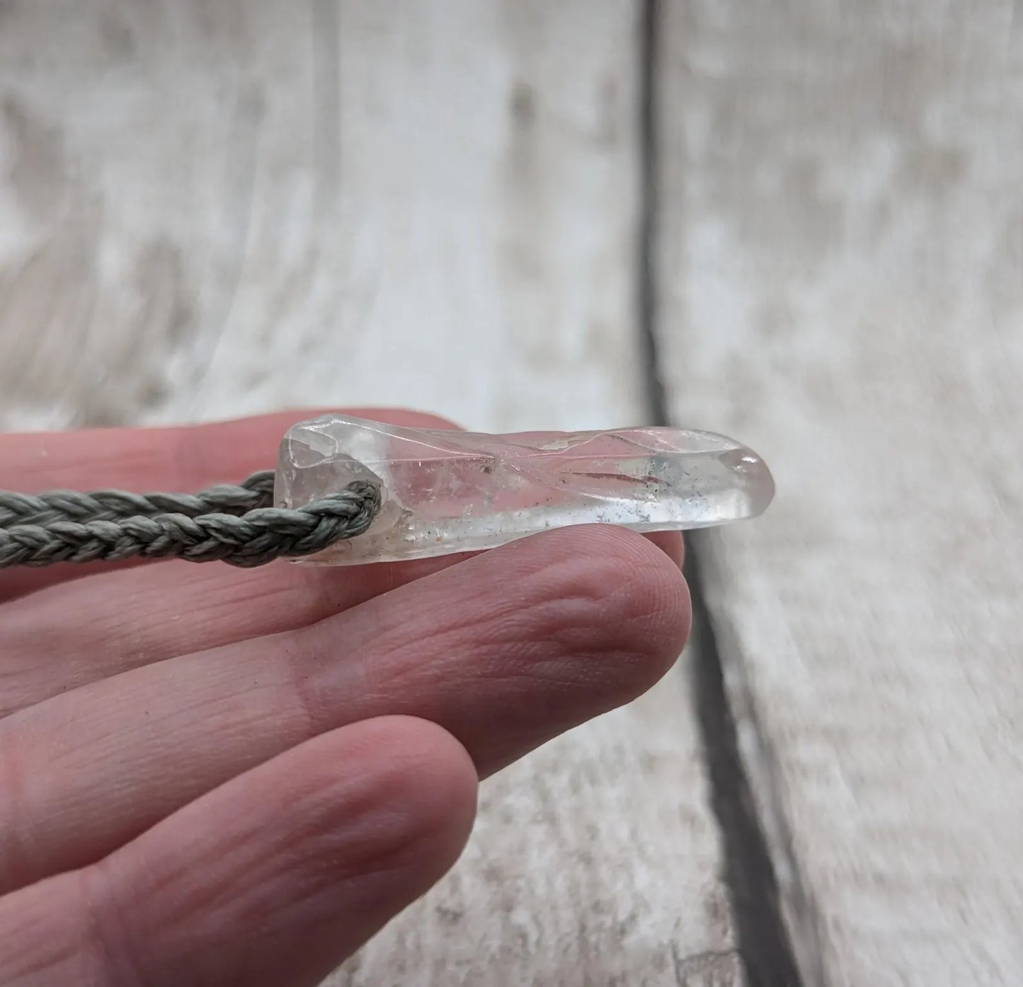 Clear quartz Crystal point pendant.