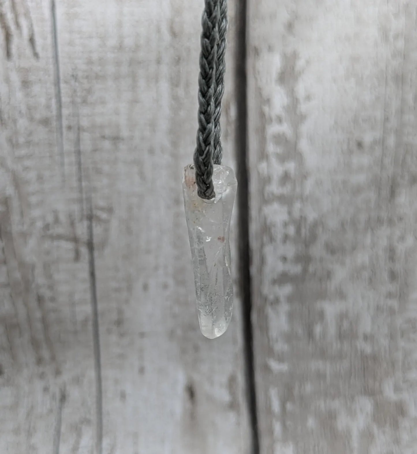 Clear quartz Crystal point pendant.