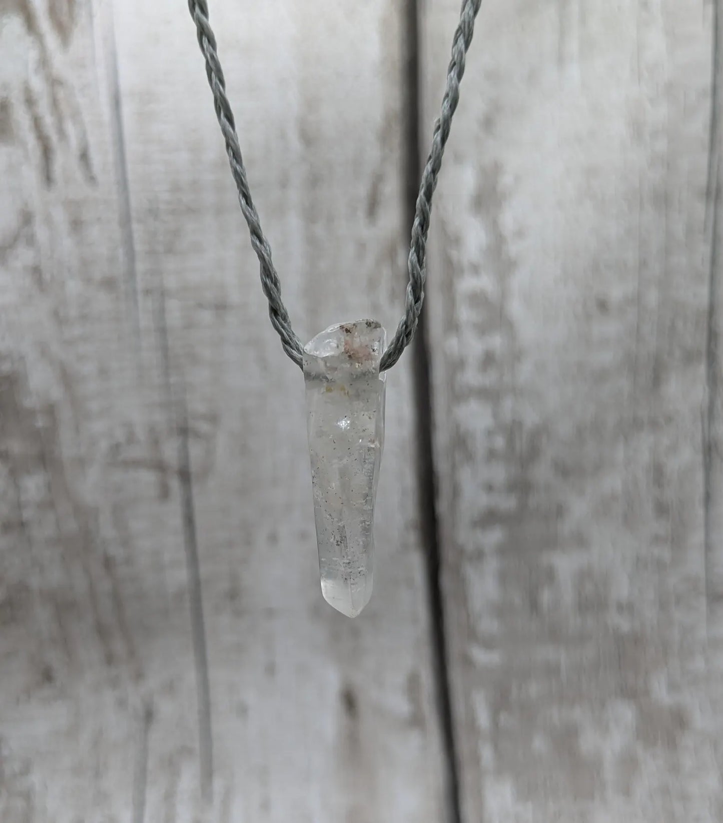 Clear quartz Crystal point pendant.