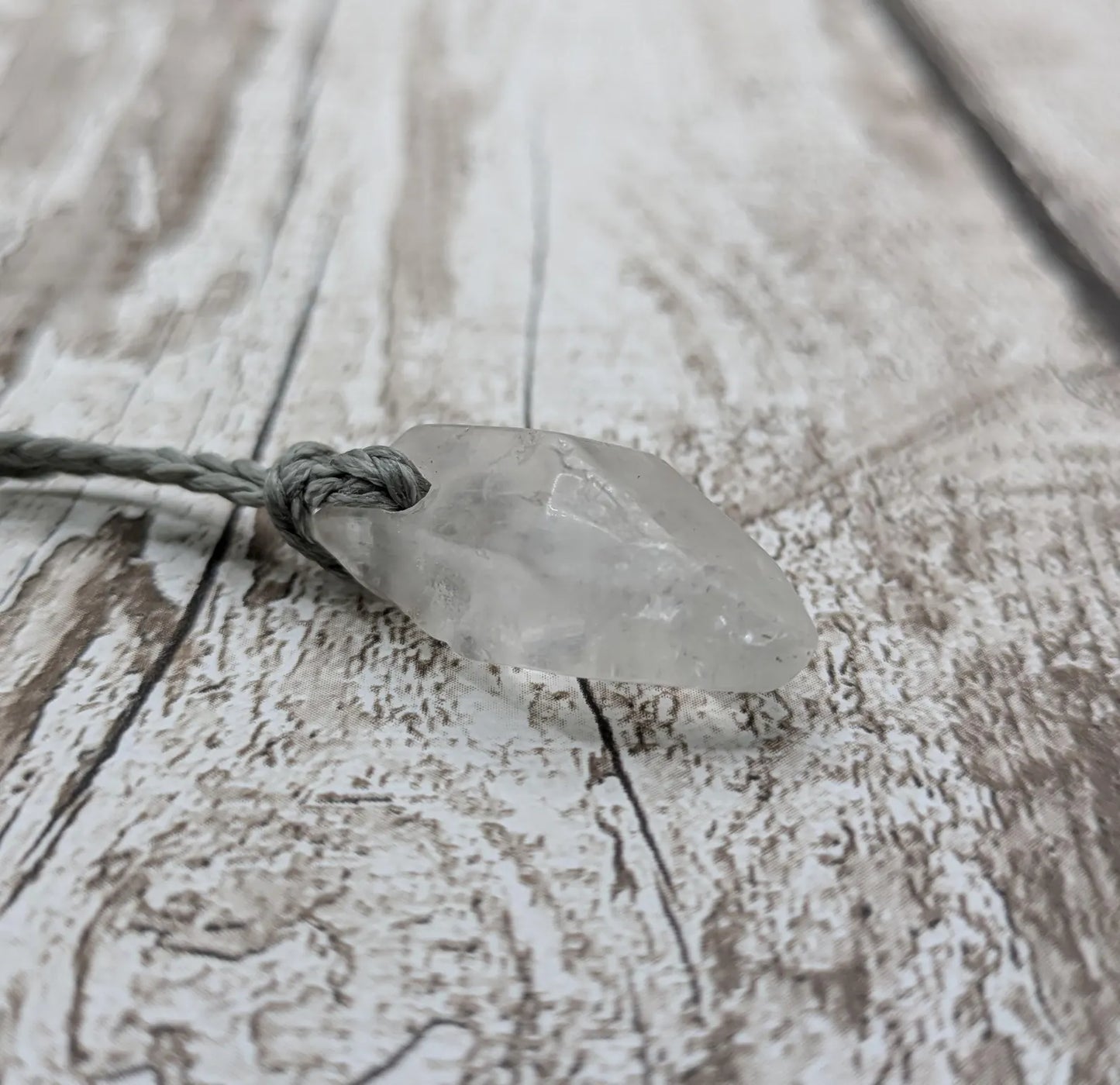 Clear quartz Crystal point pendant.