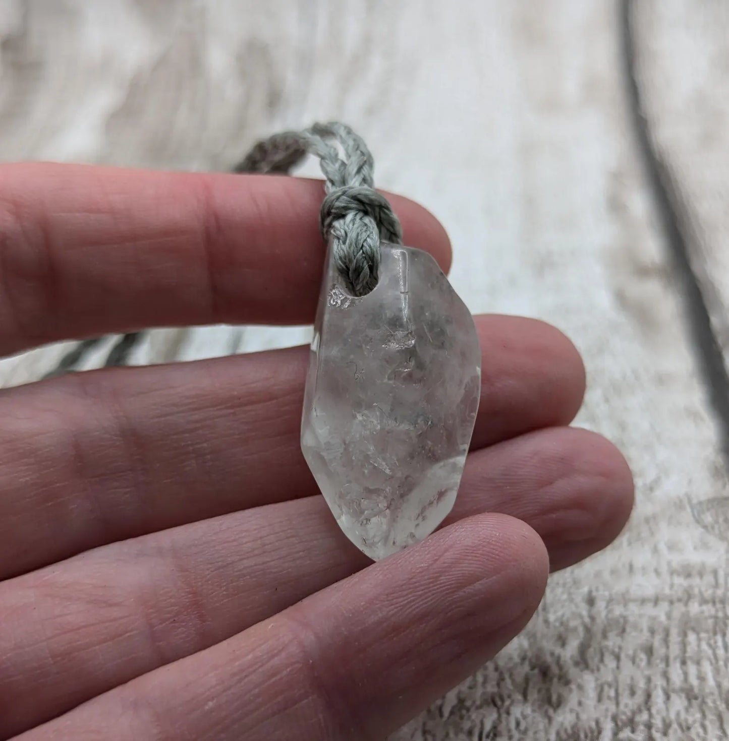 Clear quartz Crystal point pendant.