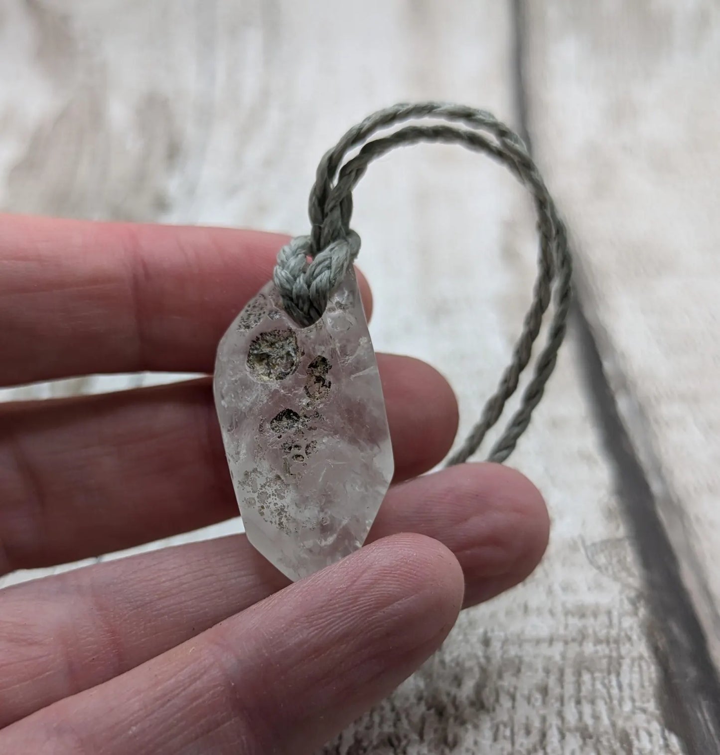 Clear quartz Crystal point pendant.