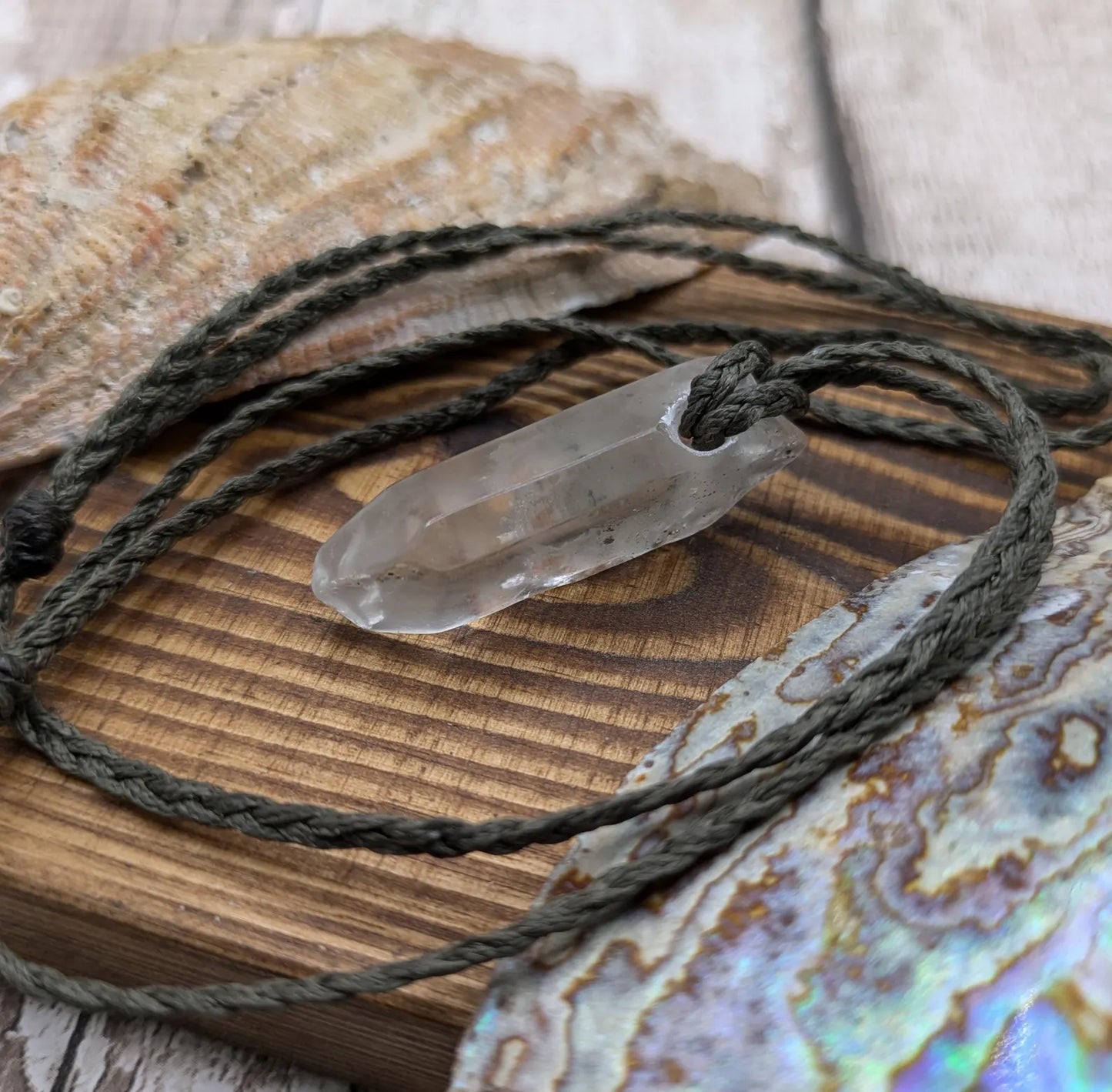 Clear quartz Crystal point pendant.