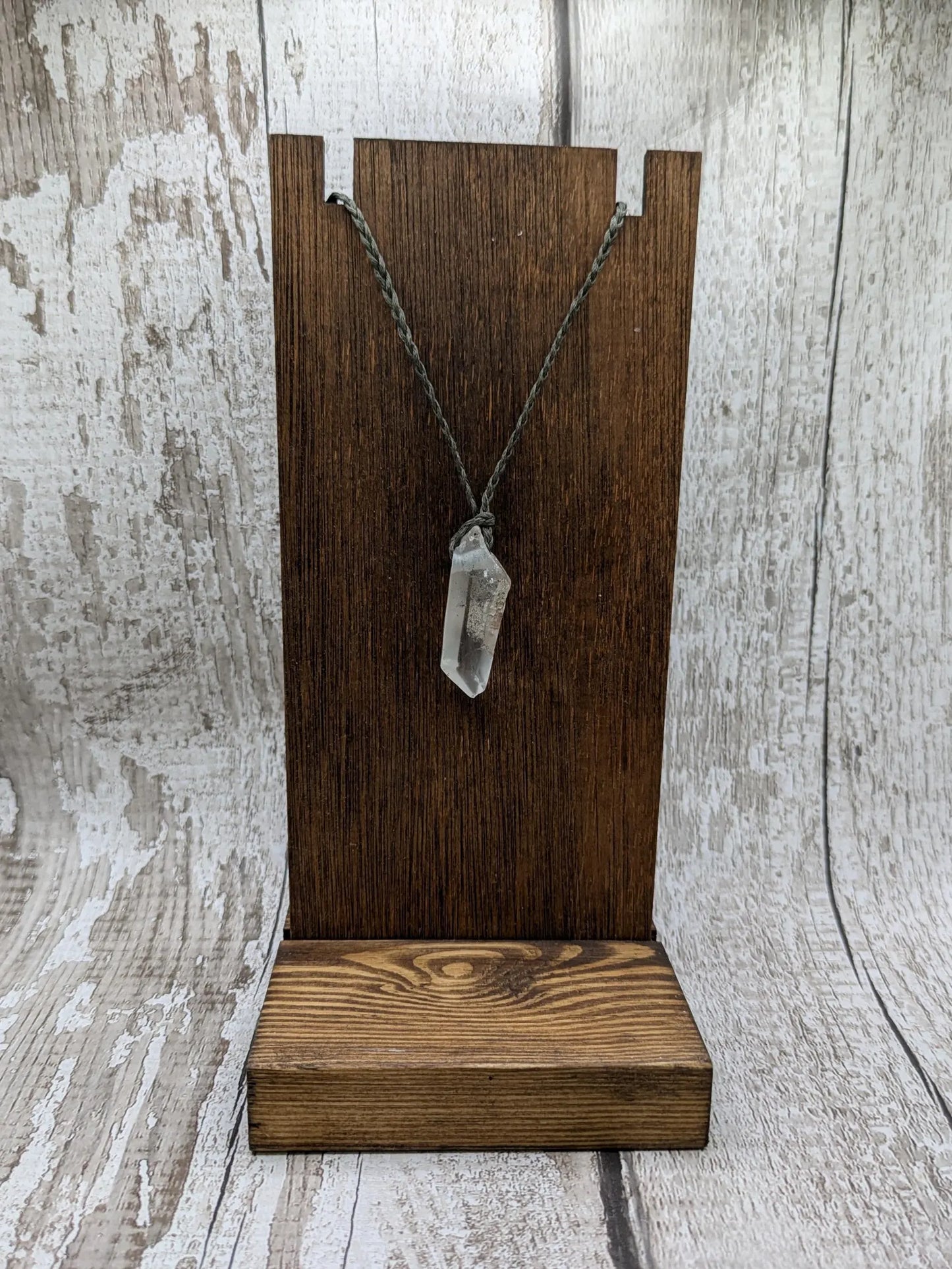 Clear quartz Crystal point pendant.