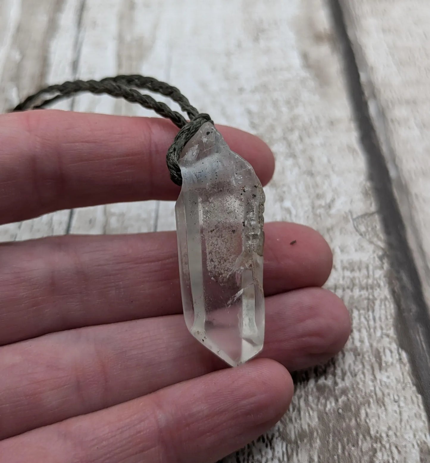 Clear quartz Crystal point pendant.