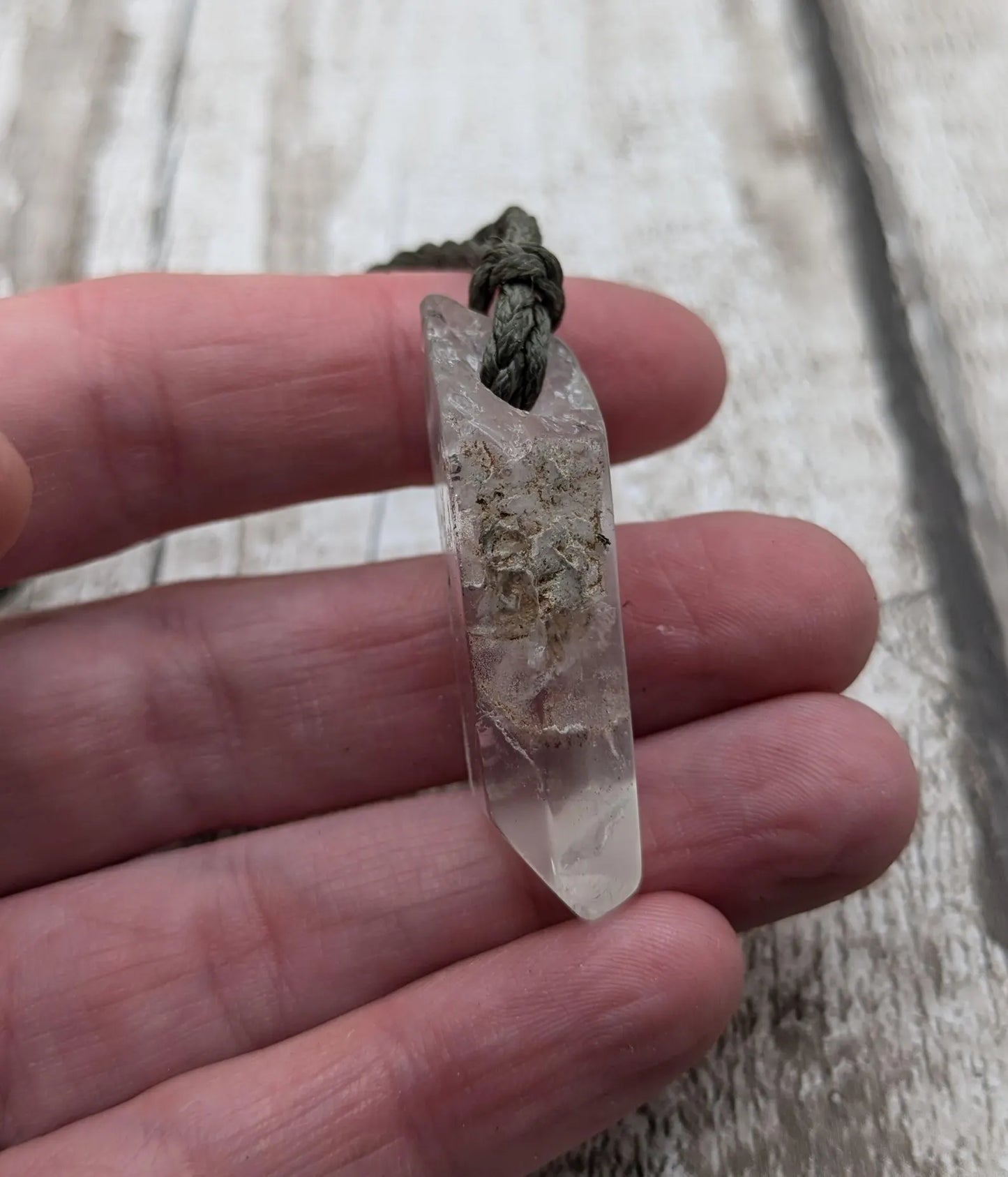 Clear quartz Crystal point pendant.