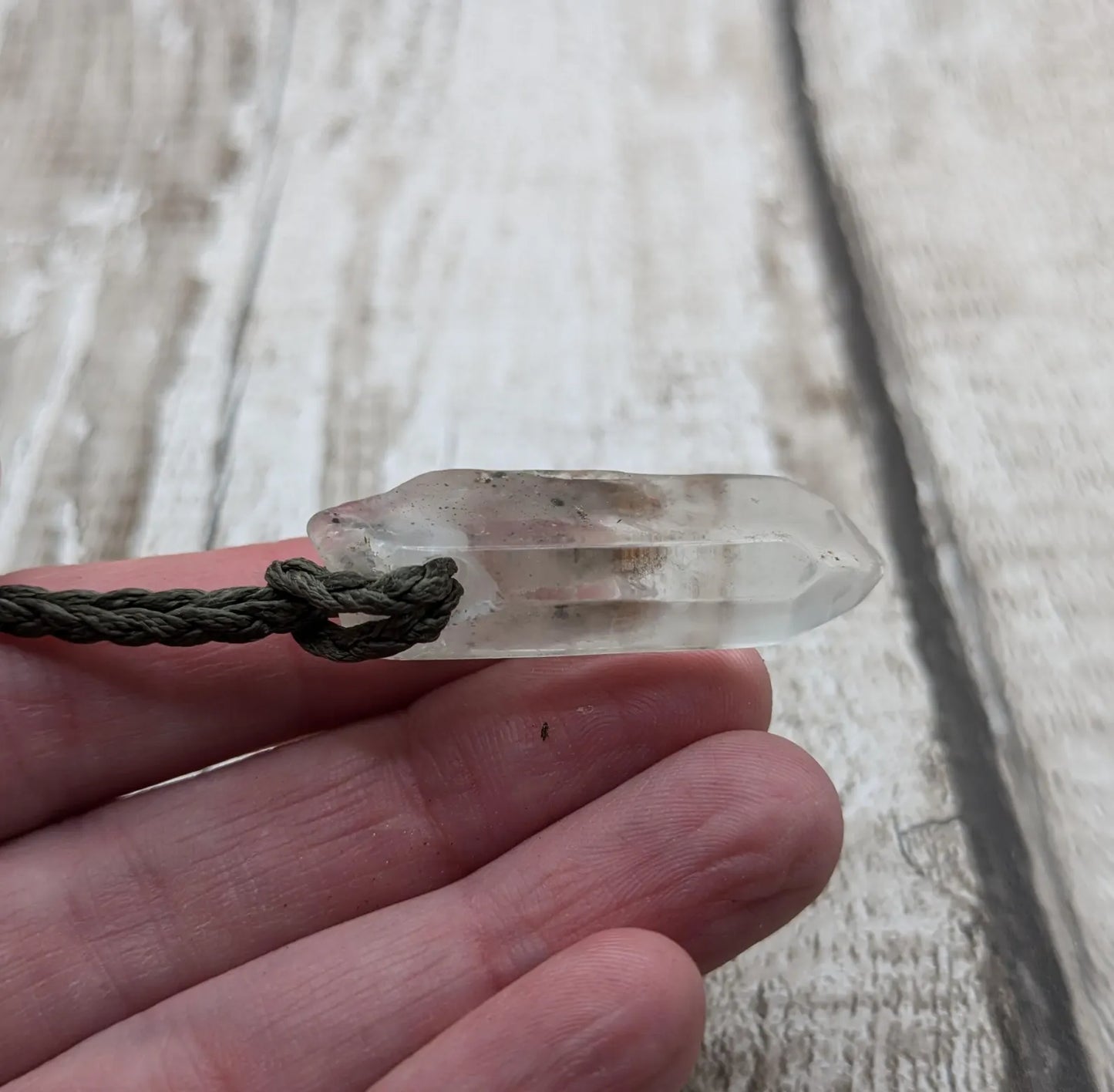 Clear quartz Crystal point pendant.