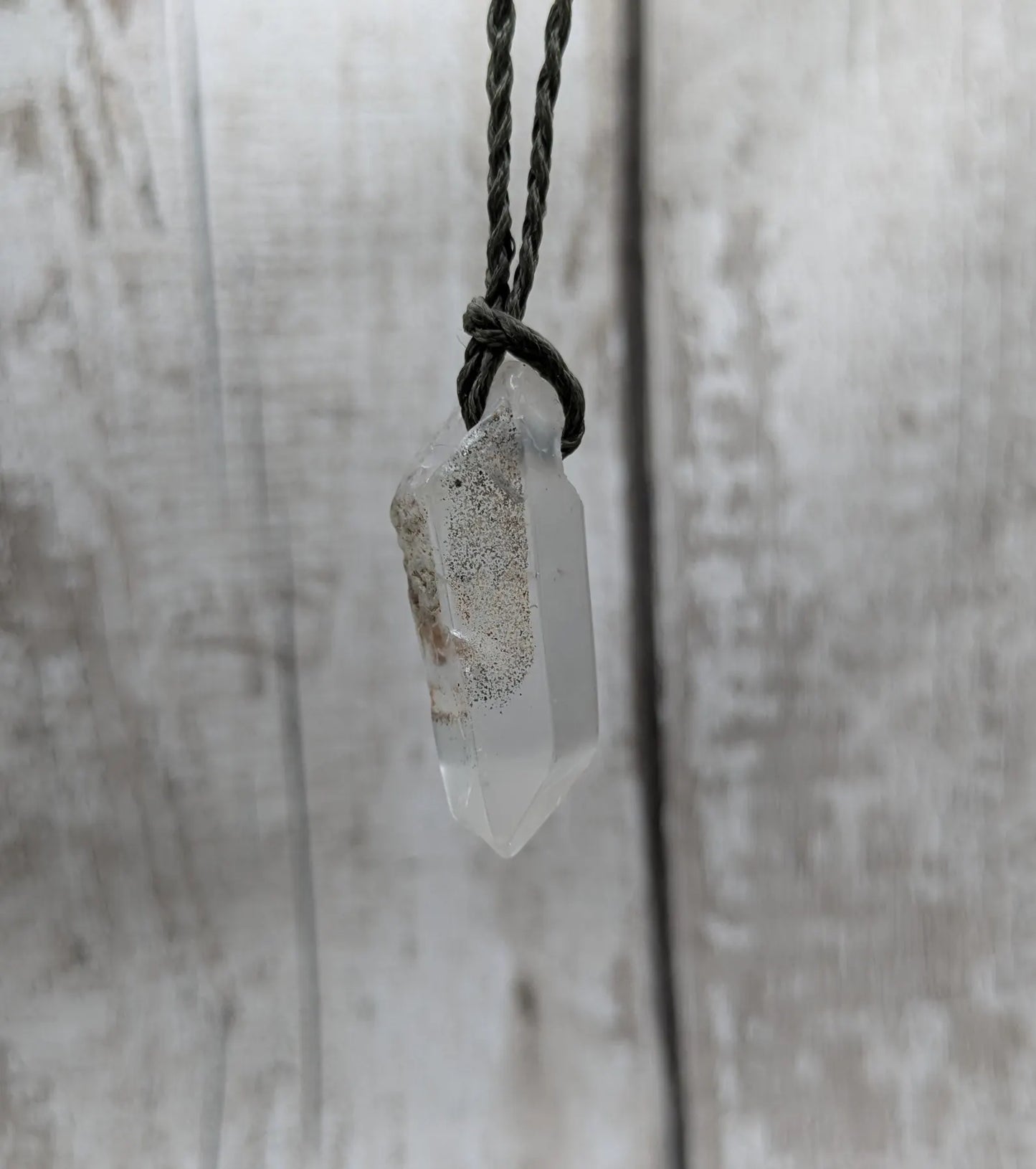 Clear quartz Crystal point pendant.