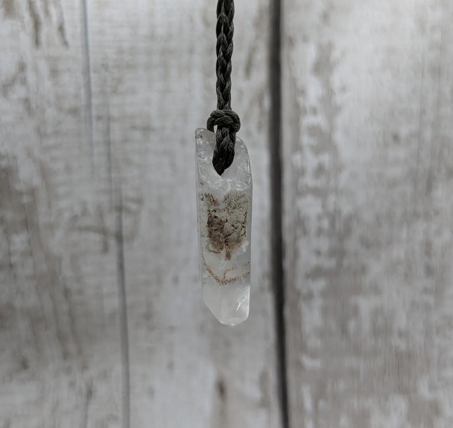 Clear quartz Crystal point pendant.