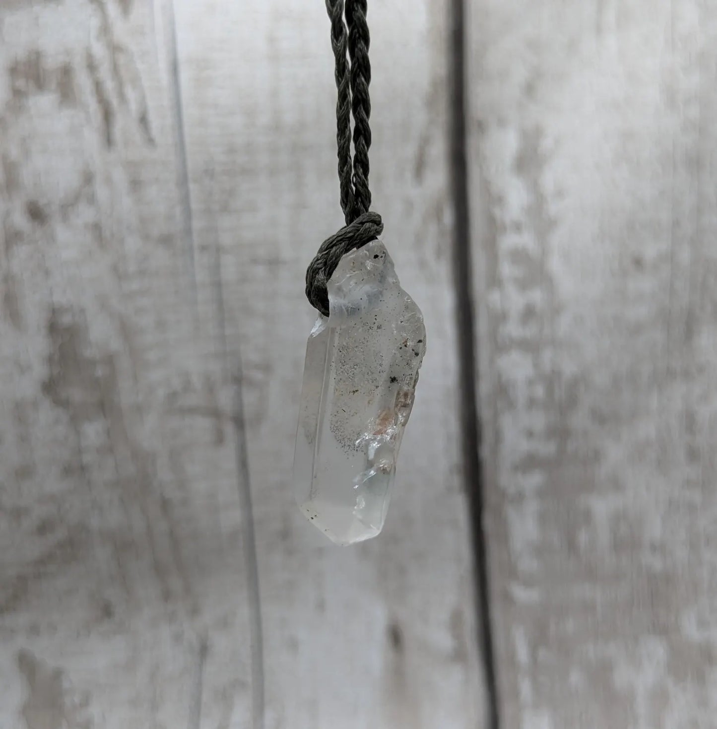 Clear quartz Crystal point pendant.