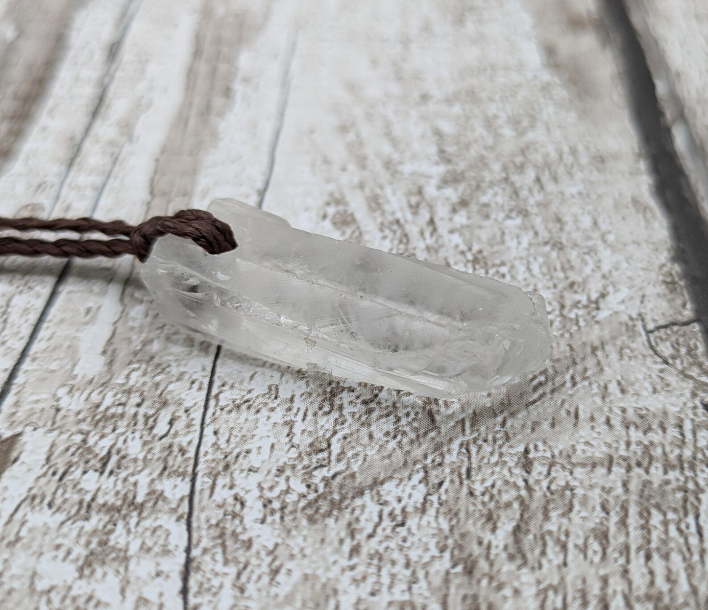 Clear quartz Crystal point pendant.