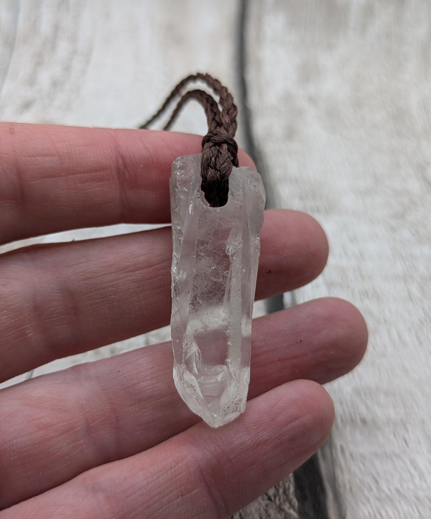 Clear quartz Crystal point pendant.