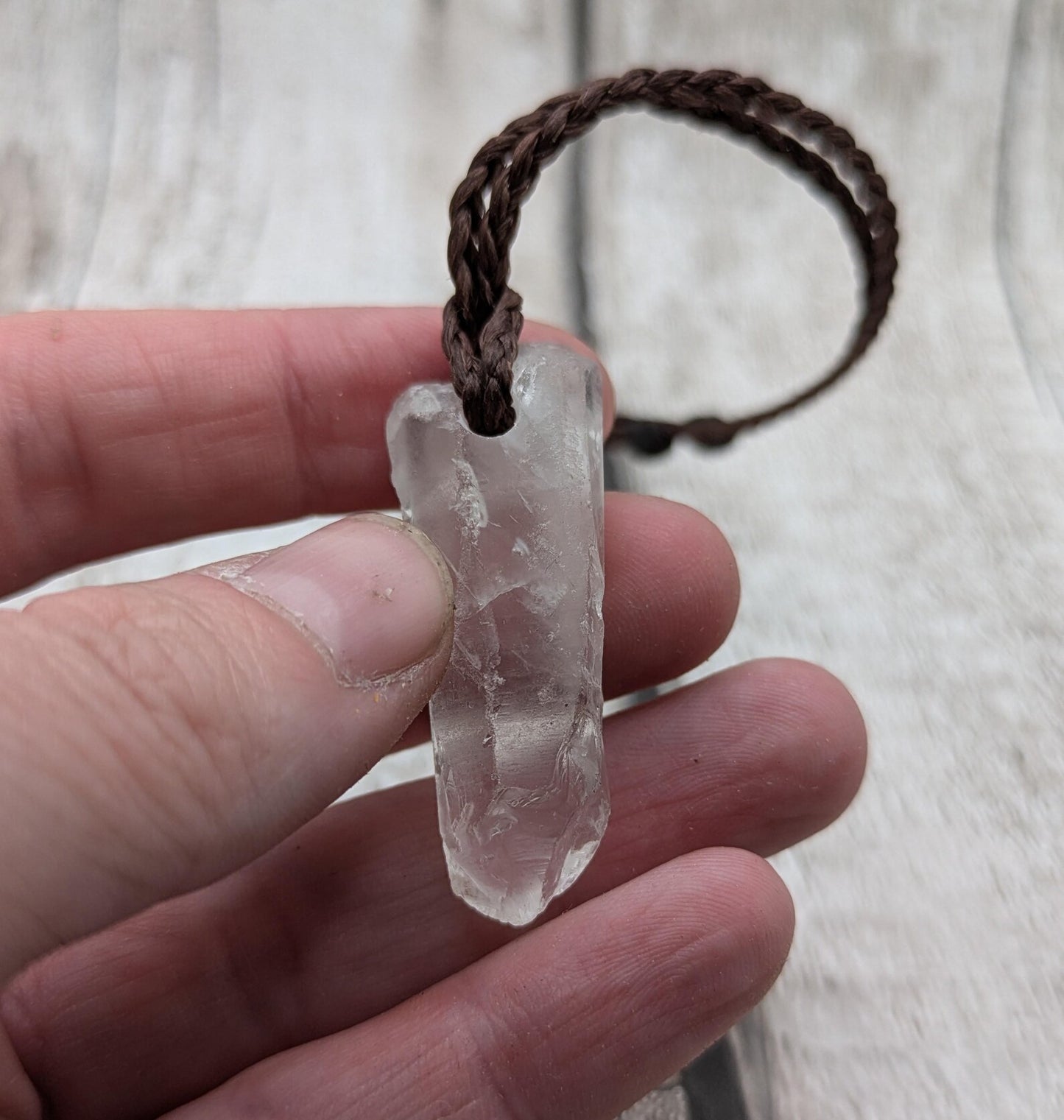 Clear quartz Crystal point pendant.