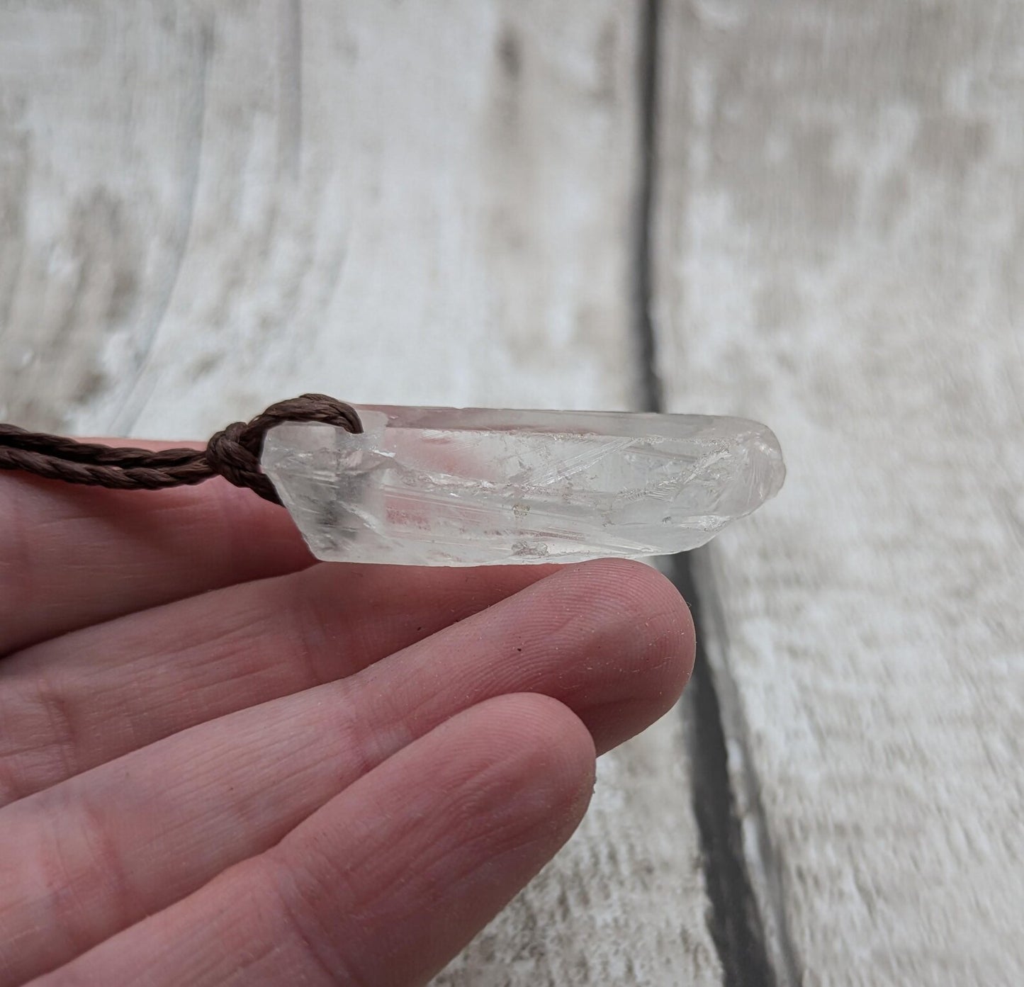 Clear quartz Crystal point pendant.