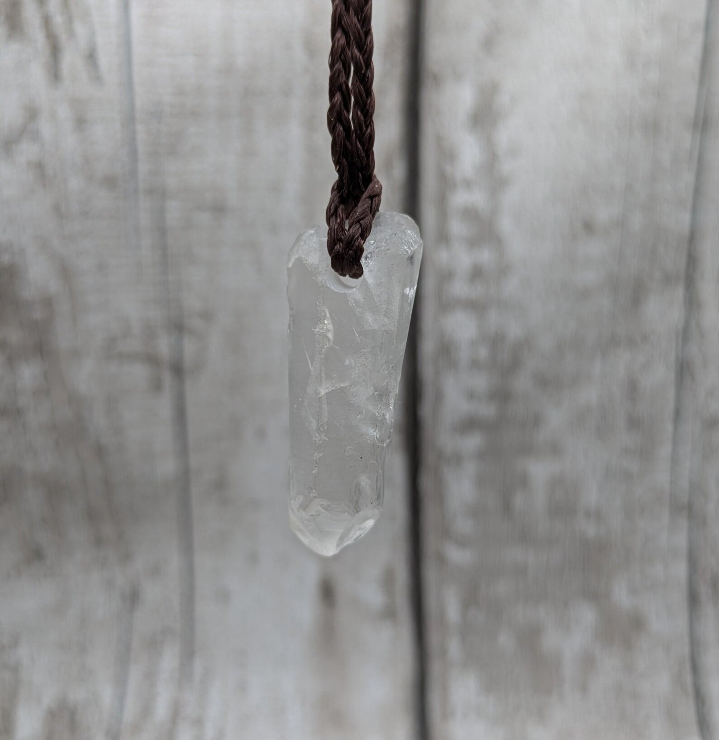 Clear quartz Crystal point pendant.