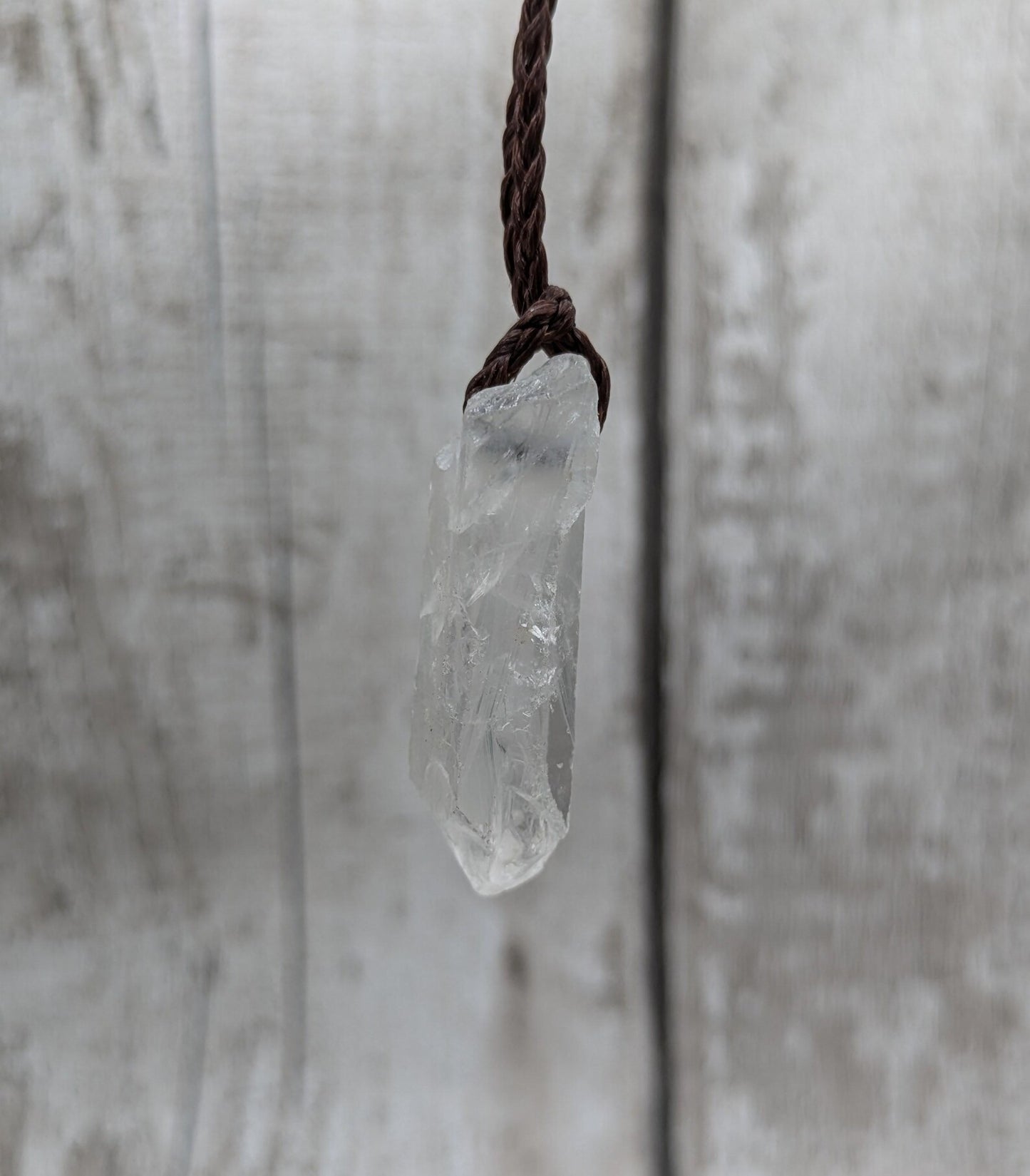 Clear quartz Crystal point pendant.