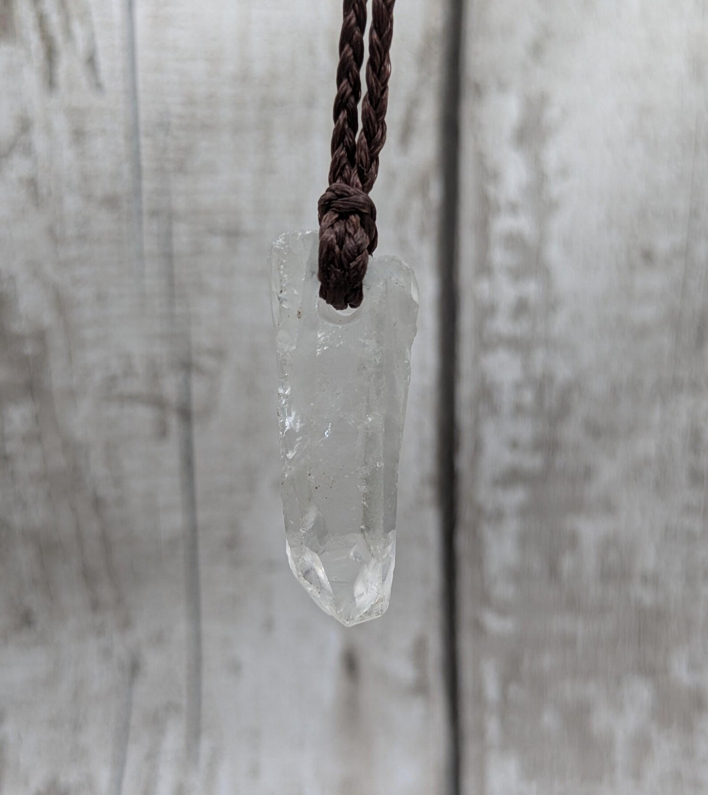 Clear quartz Crystal point pendant.