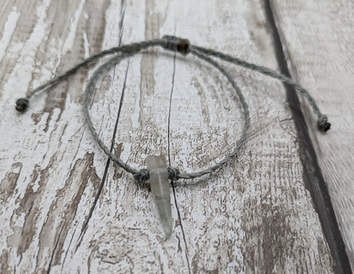 Rutilated quartz point adjustable bracelet.