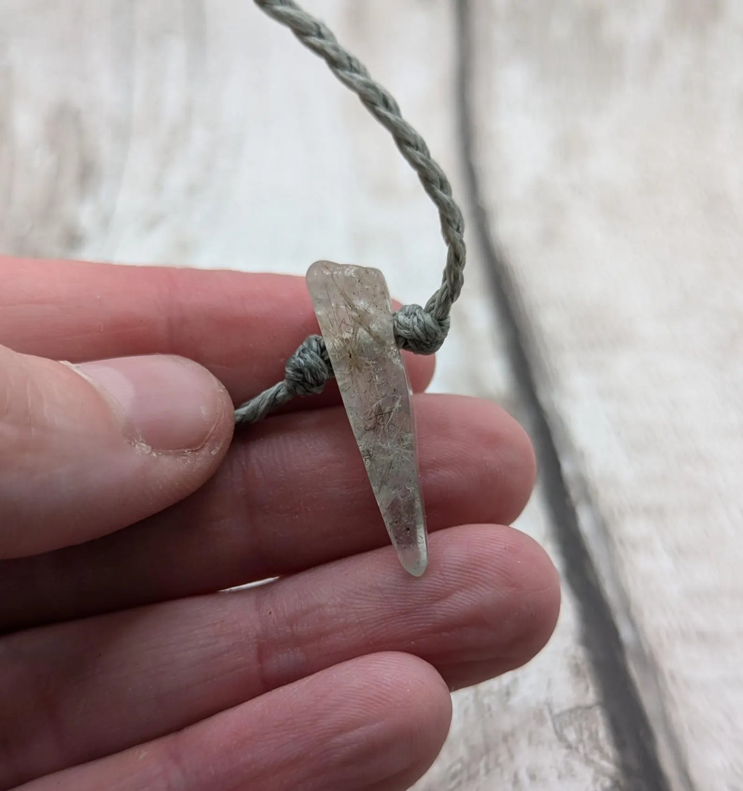 Rutilated quartz point adjustable bracelet.