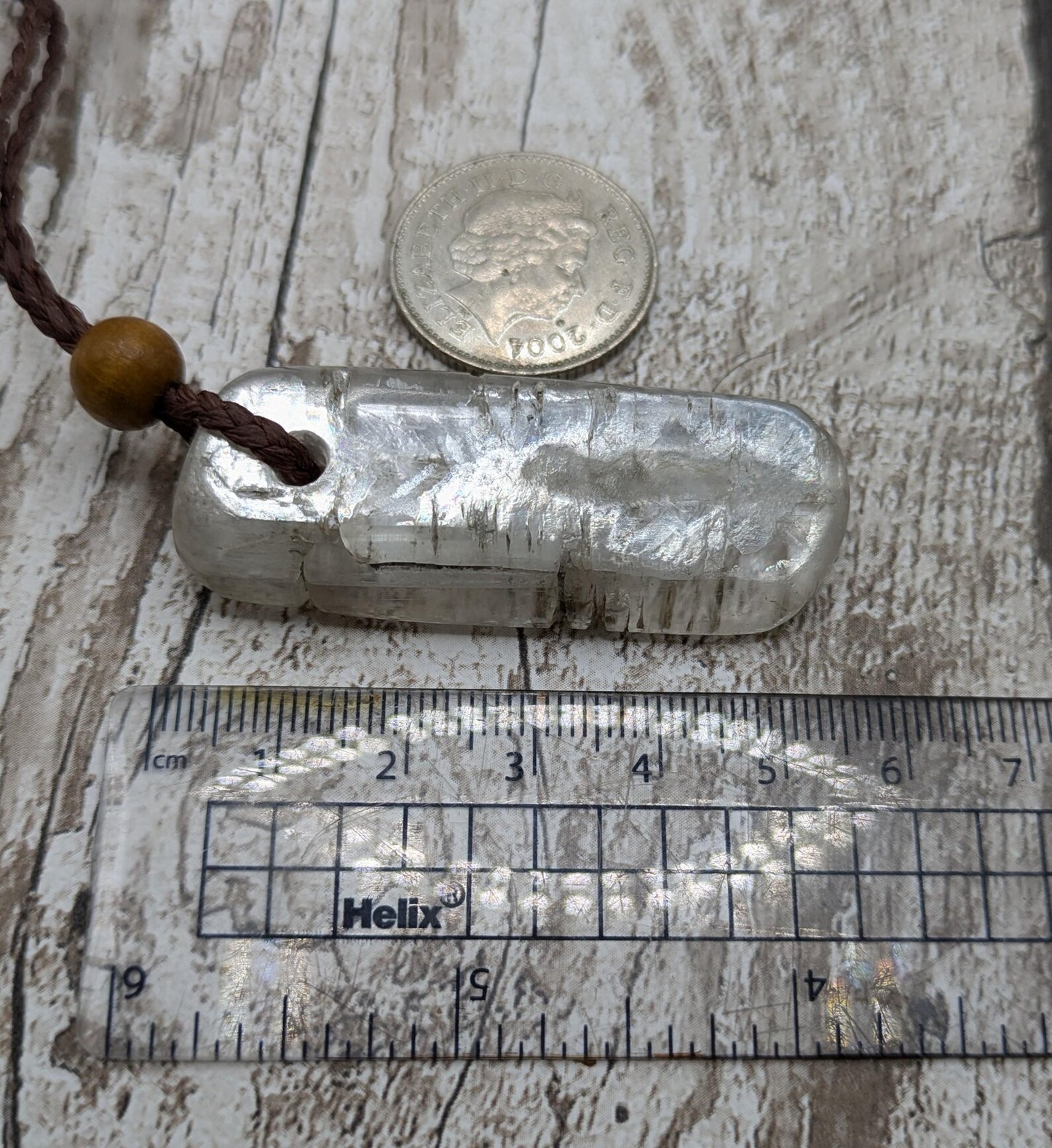 Sheppy selenite, tumbled and polished pendant.