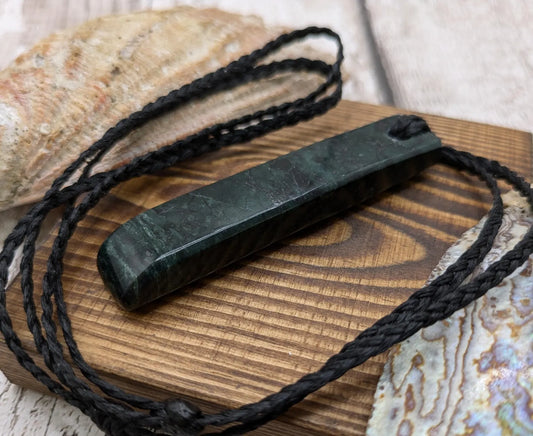 New Zealand serpentine Toki style Pounamu pendant.