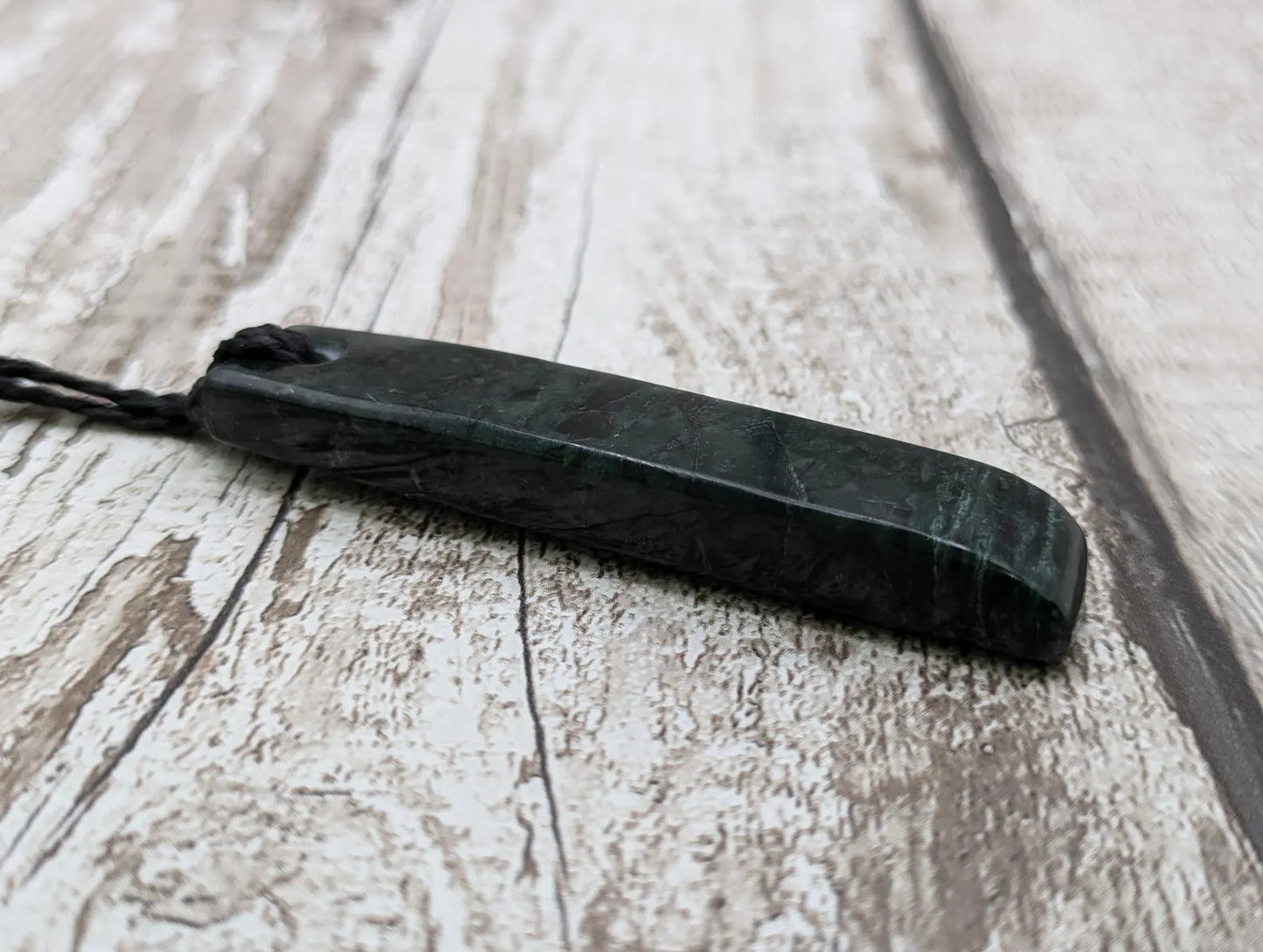 New Zealand serpentine Toki style Pounamu pendant.